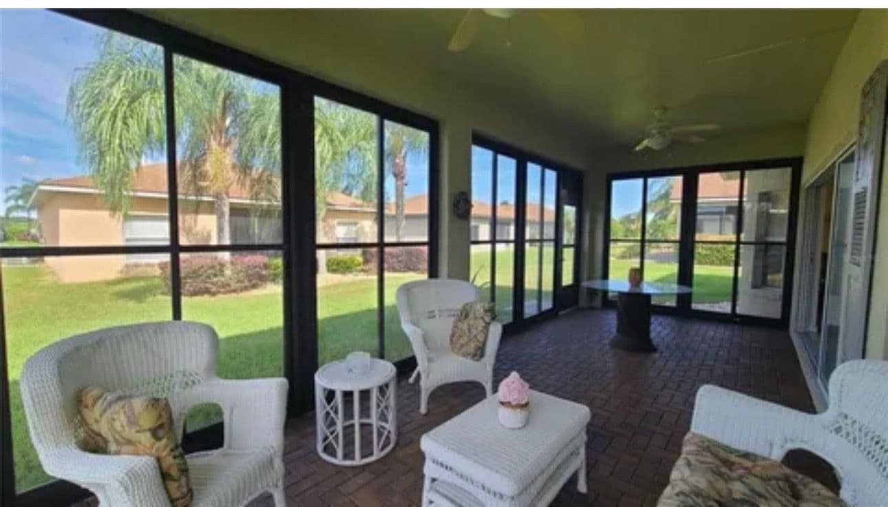 Interior and Exterior Window Cleaning on a Florida Sunroom image